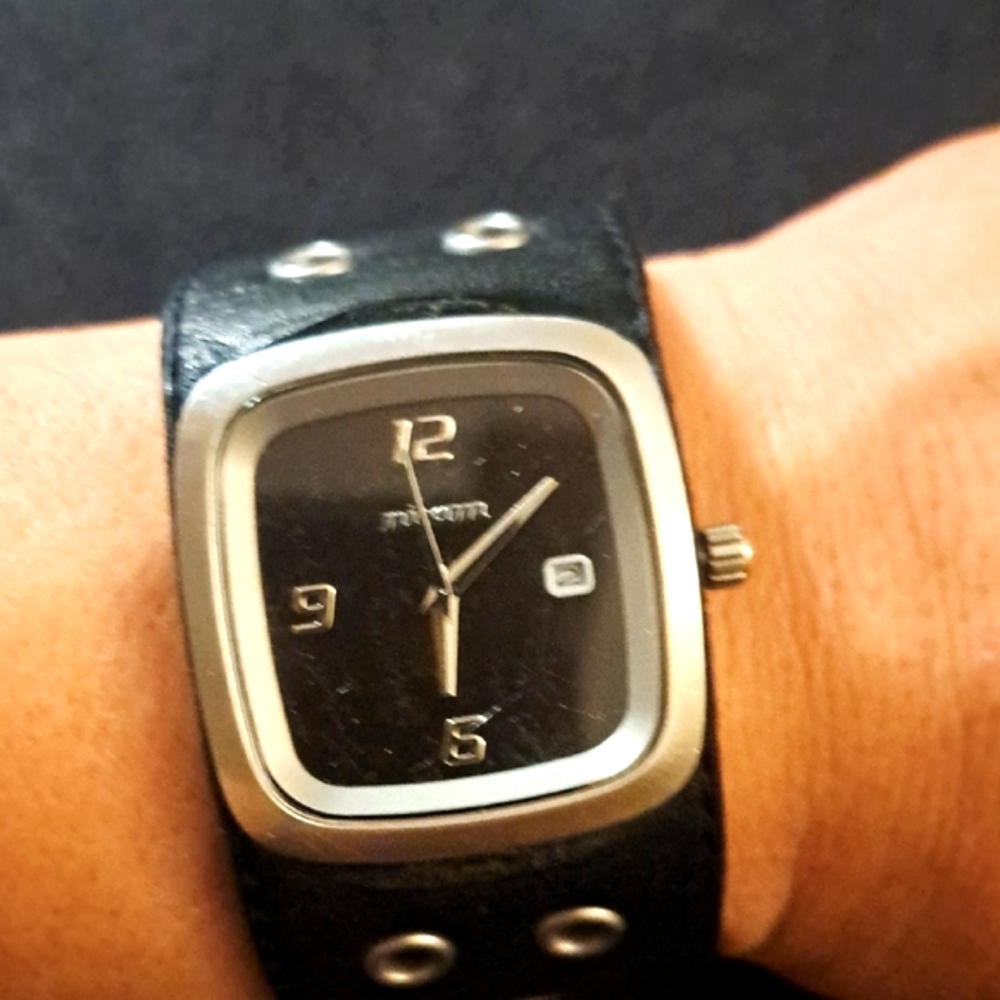 Nixon Black and Silver Watch with Bold Leather Strap